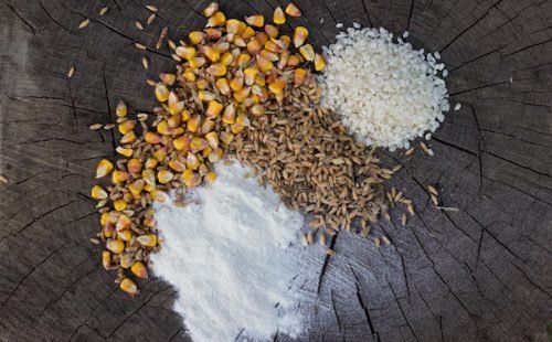 grains-food-mix-wooden-background_1212-871
