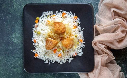 top-view-tasty-boiled-rice-with-beans-meat-inside-plate-dark-desk_179666-27241 (1)